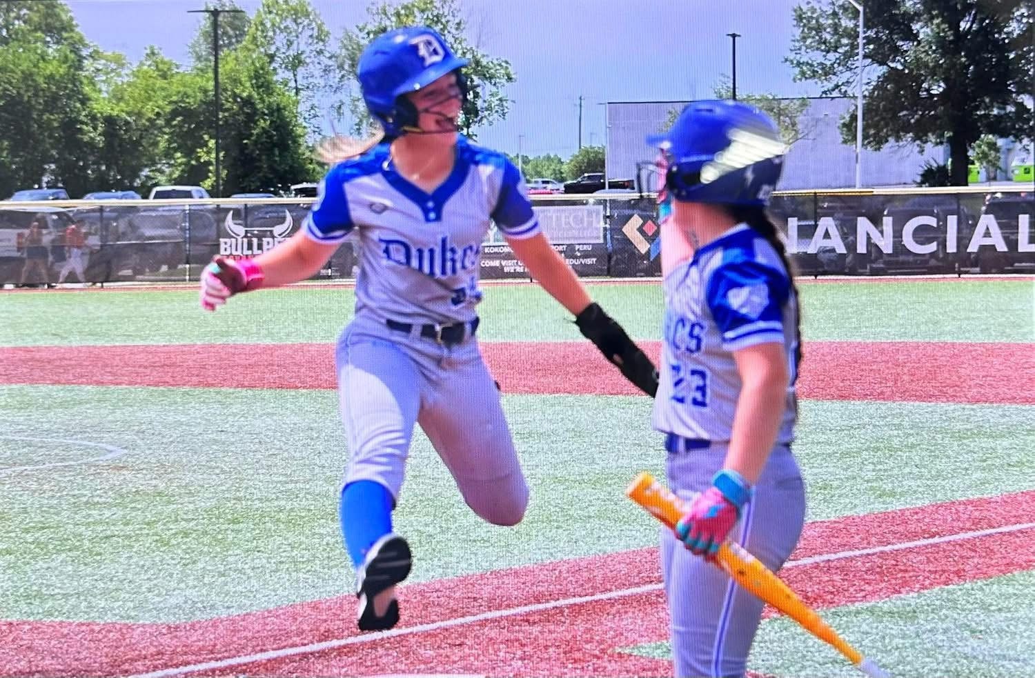 Lady Dukes player running the bases